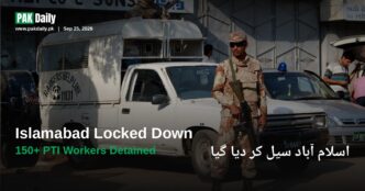 A Pakistan Rangers soldier stands guard beside a Rangers vehicle, as security is tightened ahead of PTI's Sept 27 Islamabad march